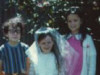 Angela, and her Cousins Judith and Dominic, at her first holy communion©